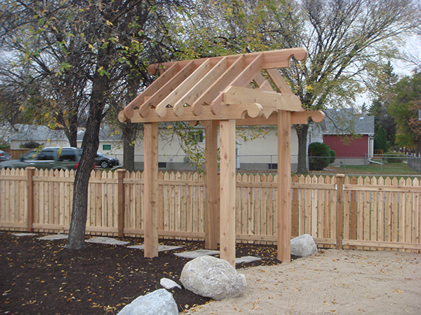 arbor daycare daycare playground enclosed by cedar fence shelter with built in shed bed arbor daycare daycare playground enclosed by cedar fence shelter with built in shed bed