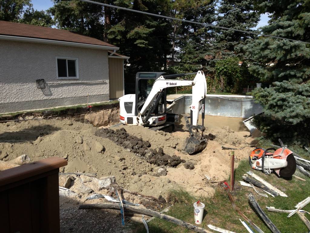 Backyard renovation — Step 1:  remove swimming pool