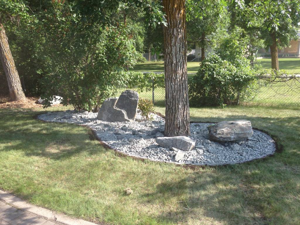 Low Maintenance Garden with Black Granite Boulders