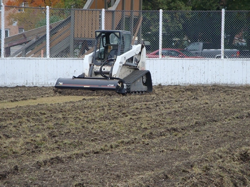 Re-grading and sodding inside a hockey rink