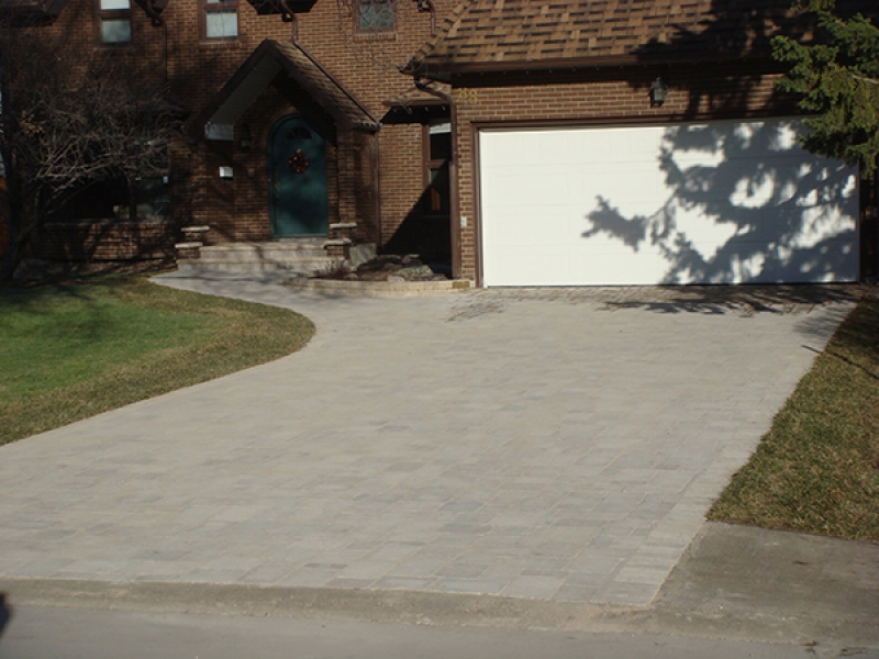 Roman paving stone driveway and front walk. Roman paving stones glued to existing front step.