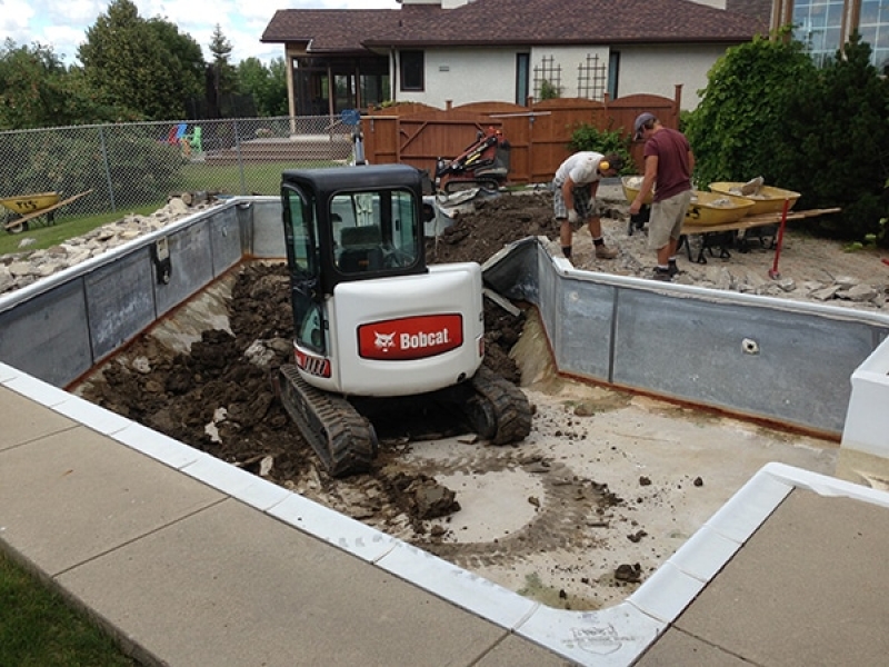 Swimming pool removal with access for larger machine.