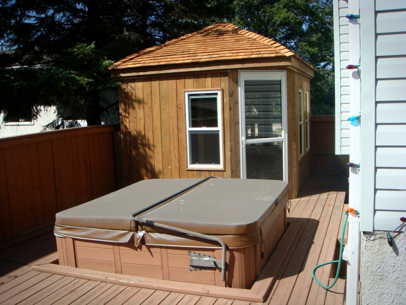 Gazebo and changeroom built onto deck with built-in hot tub