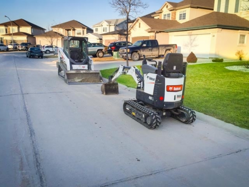 Bobcat 418 excavator and Bobcat T450 compact track loader