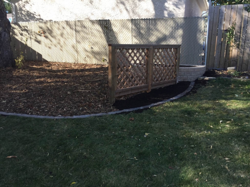 Lattice wall with stone planter