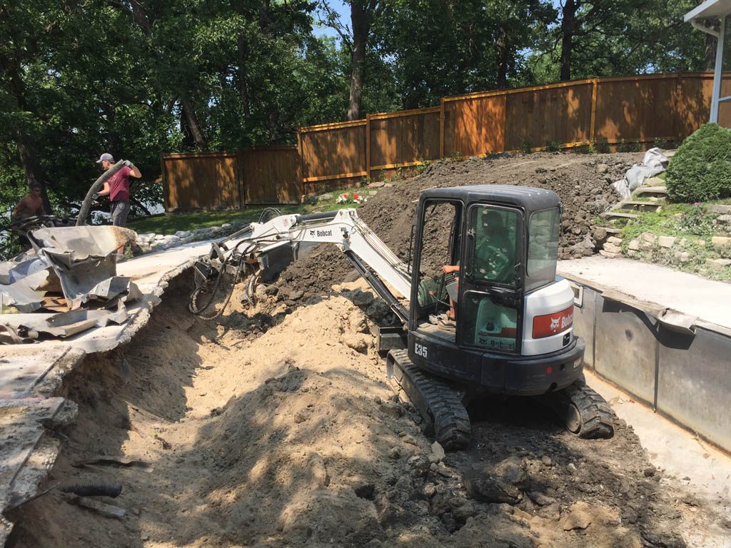 Swimming pool removal from riverbank yard