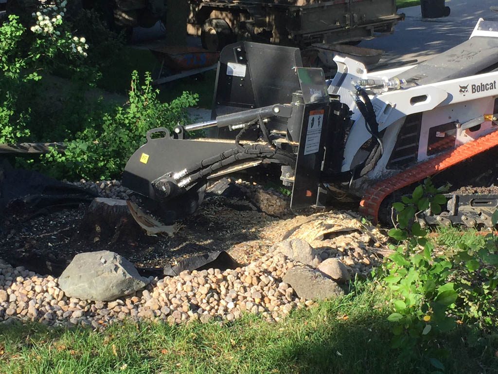 Stump grinding with mini skid steer