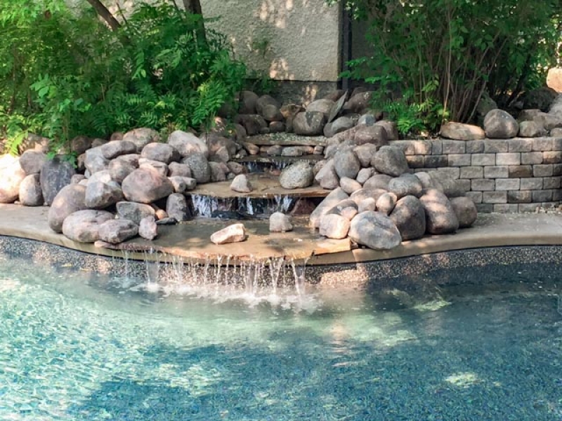 Waterfall into pool, boulders, Pisa II retaining wall,etc