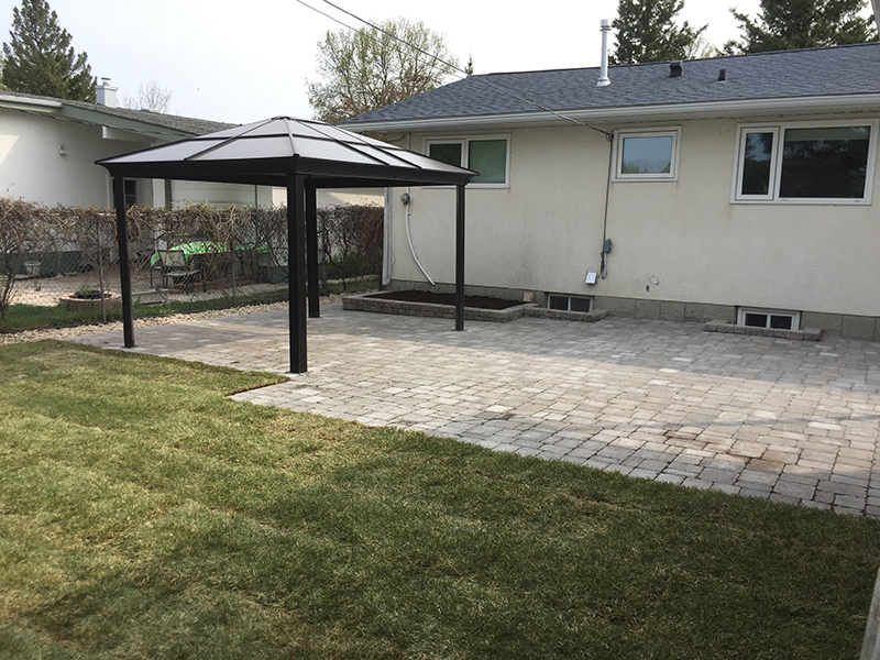 Roman paver patio and window wells