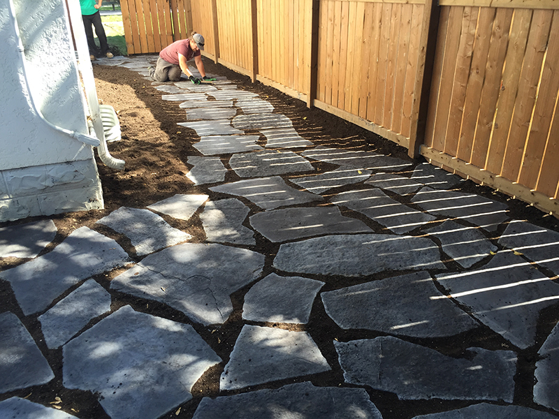 Path through garden with Grand Flagstone in Pacific Grey