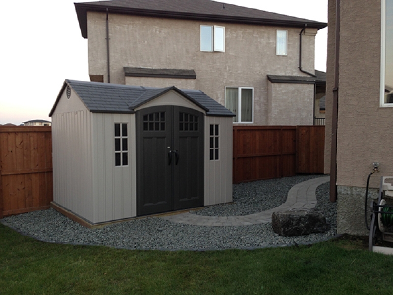 Verano paver walk from drive to back yard. Roman paver walk to shed. Vinyl shed on wood base