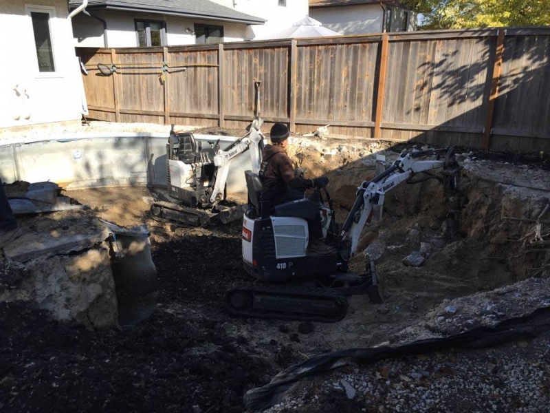 Removing concrete and steel walls from inground pool