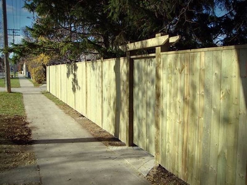 6ft treated green fence with crossbar over gate and 6x6 posts (fences)