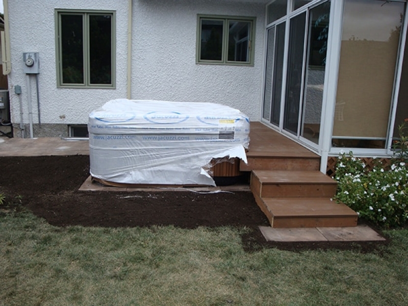 Hot tub surrounded by composite deck