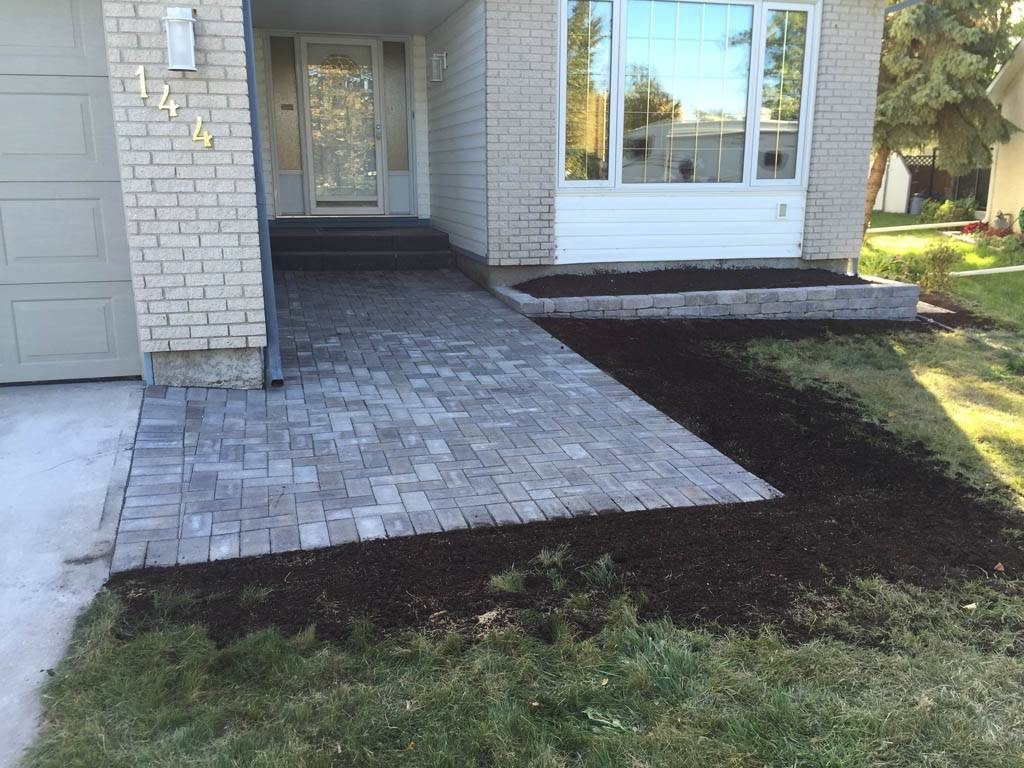 Holland front walk with Quarry Stone planter