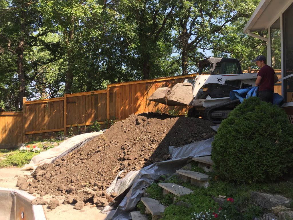 Swimming pool removal from riverbank yard