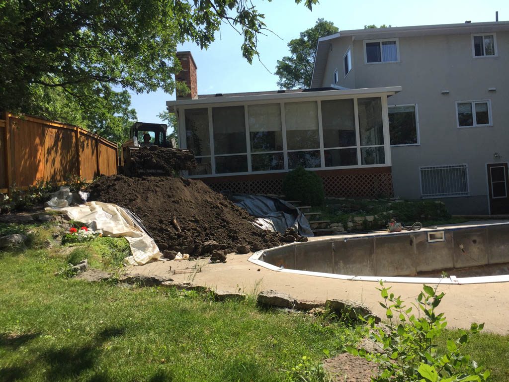 Swimming pool removal from riverbank yard