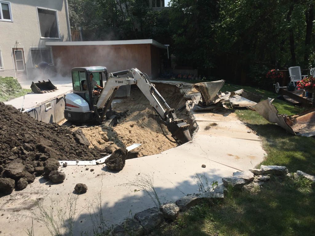 Swimming pool removal from riverbank yard