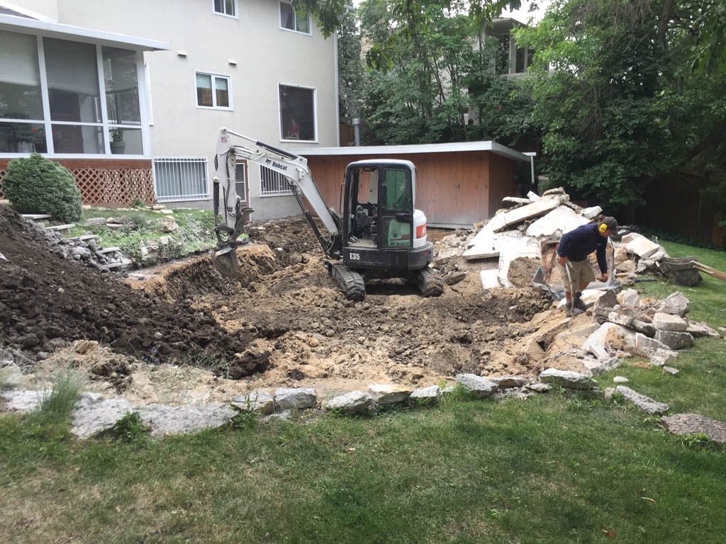 Swimming pool removal from riverbank yard