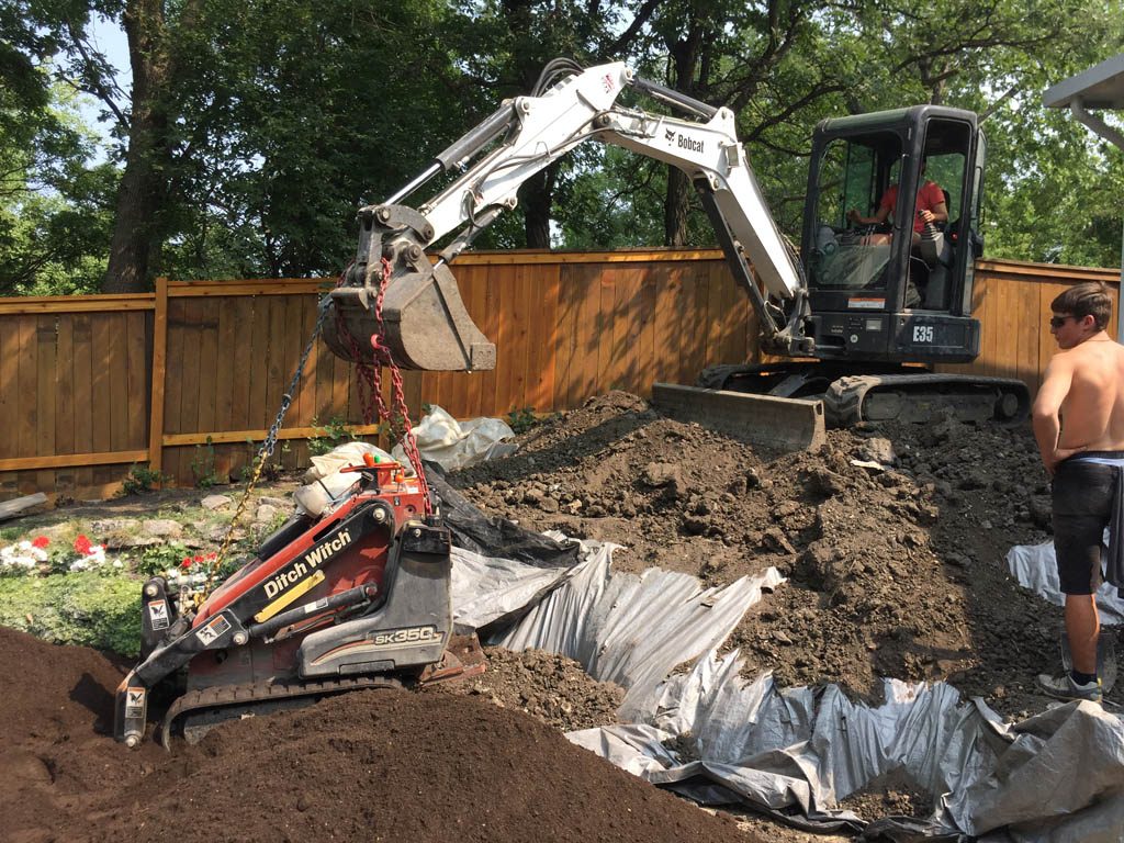 Swimming pool removal from riverbank yard