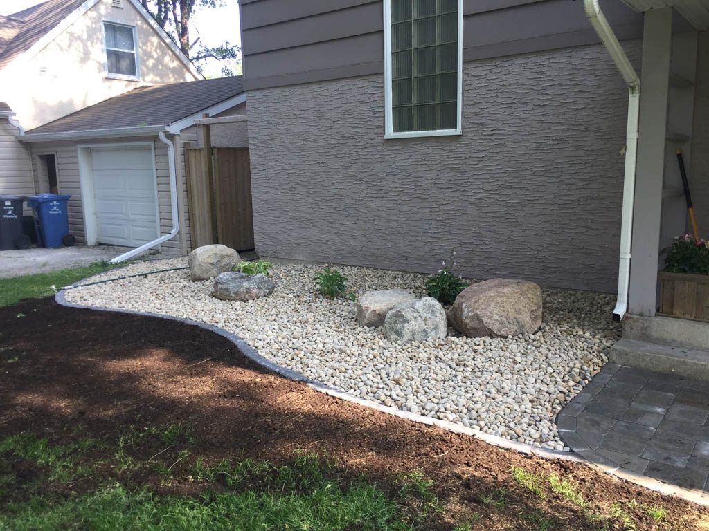 Flagstone steppers, boulders, granite edgers, etc