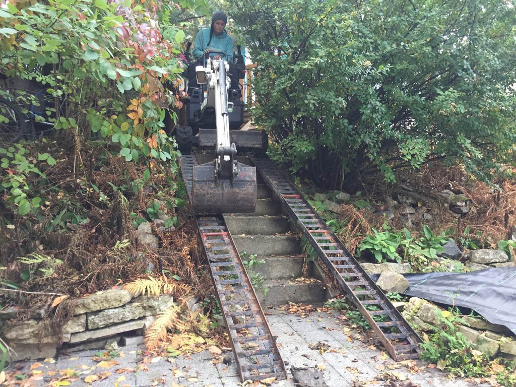 Pool removal from riverbank yard with small machine access only