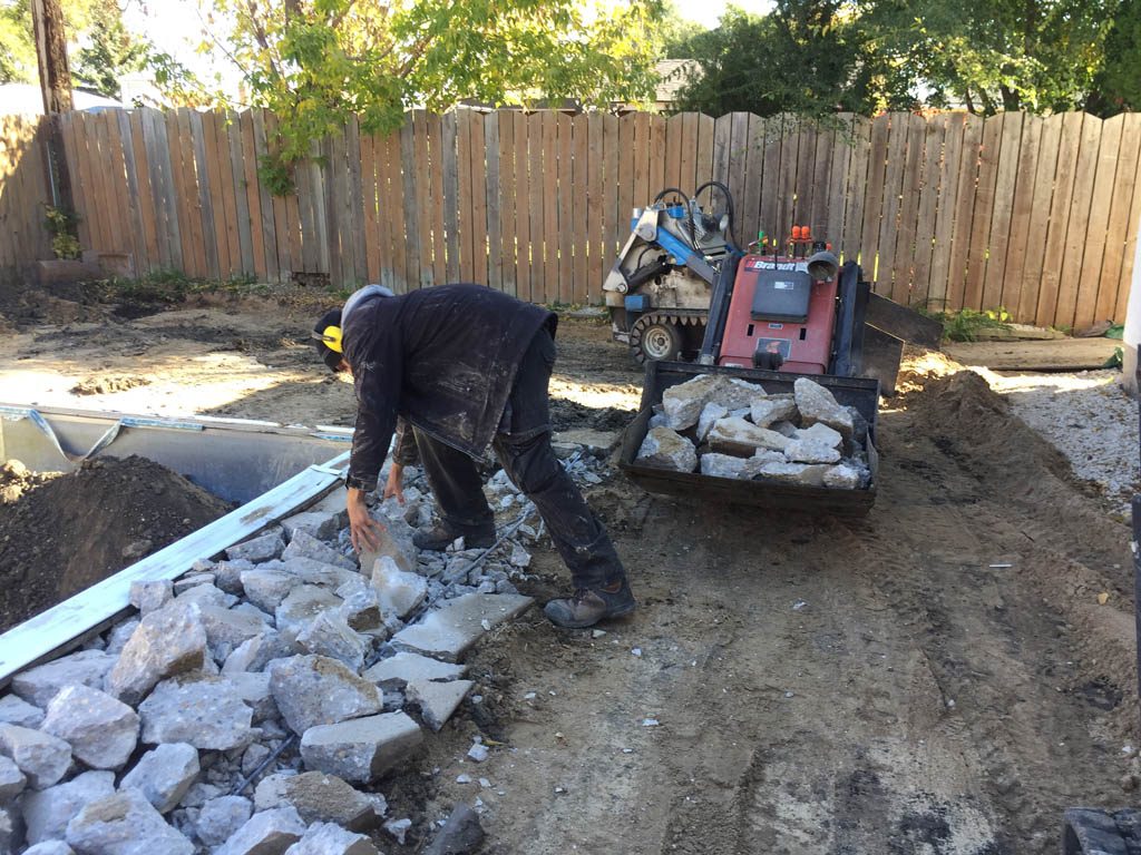 Swimming pool removal from back yard