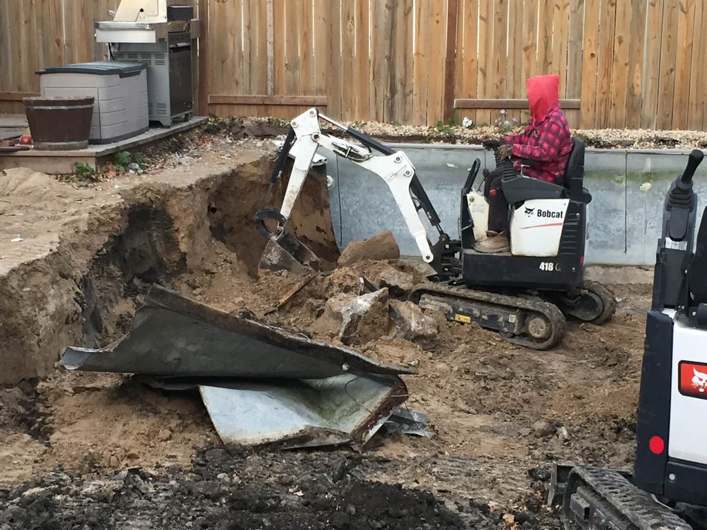 Swimming pool removal from back yard