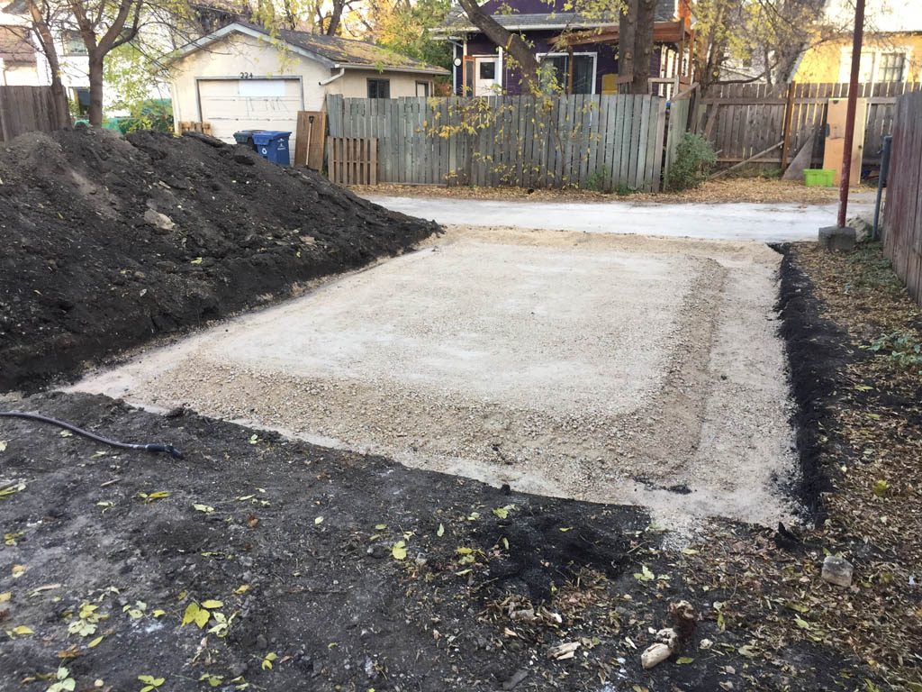 Excavation and prep work for basement expansion and garage pad