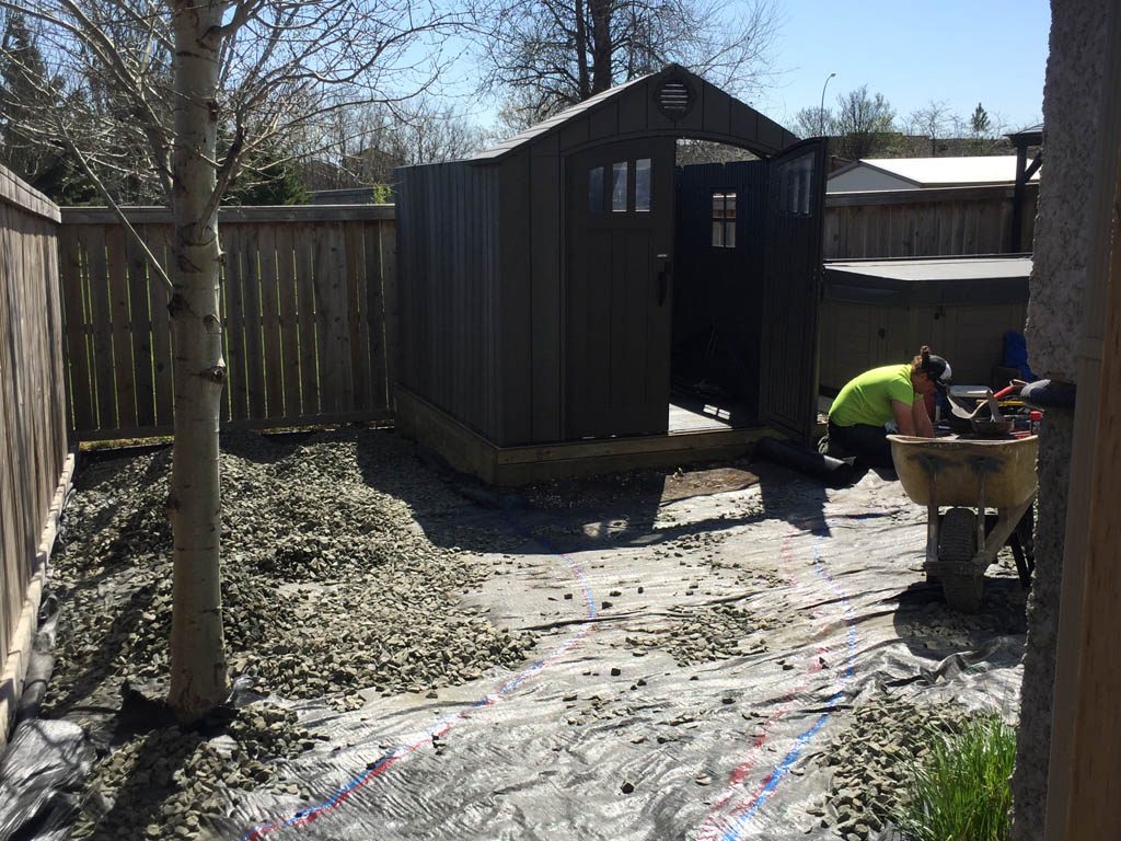 Shed installation on sloped yard