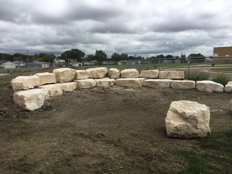 Outdoor Classroom Tiered Retaining Wall Seating with Limestone Boulders