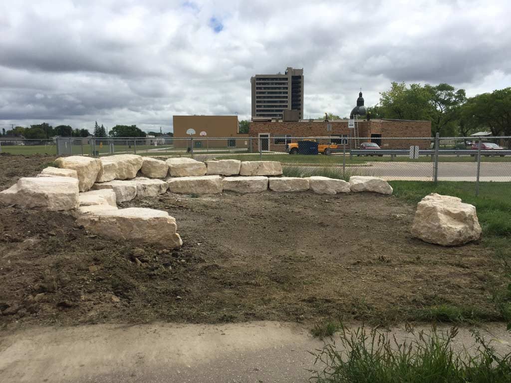 Outdoor Classroom Tiered Retaining Wall Seating with Limestone Boulders